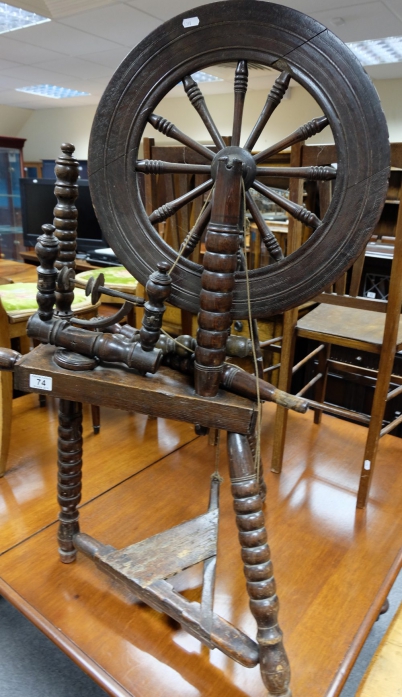 Appraisal: th century oak sewing treadle