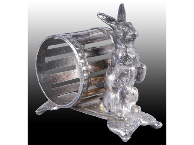 Appraisal: Standing Rabbit by Open-Work Figural Napkin Ring Description Narrow footed