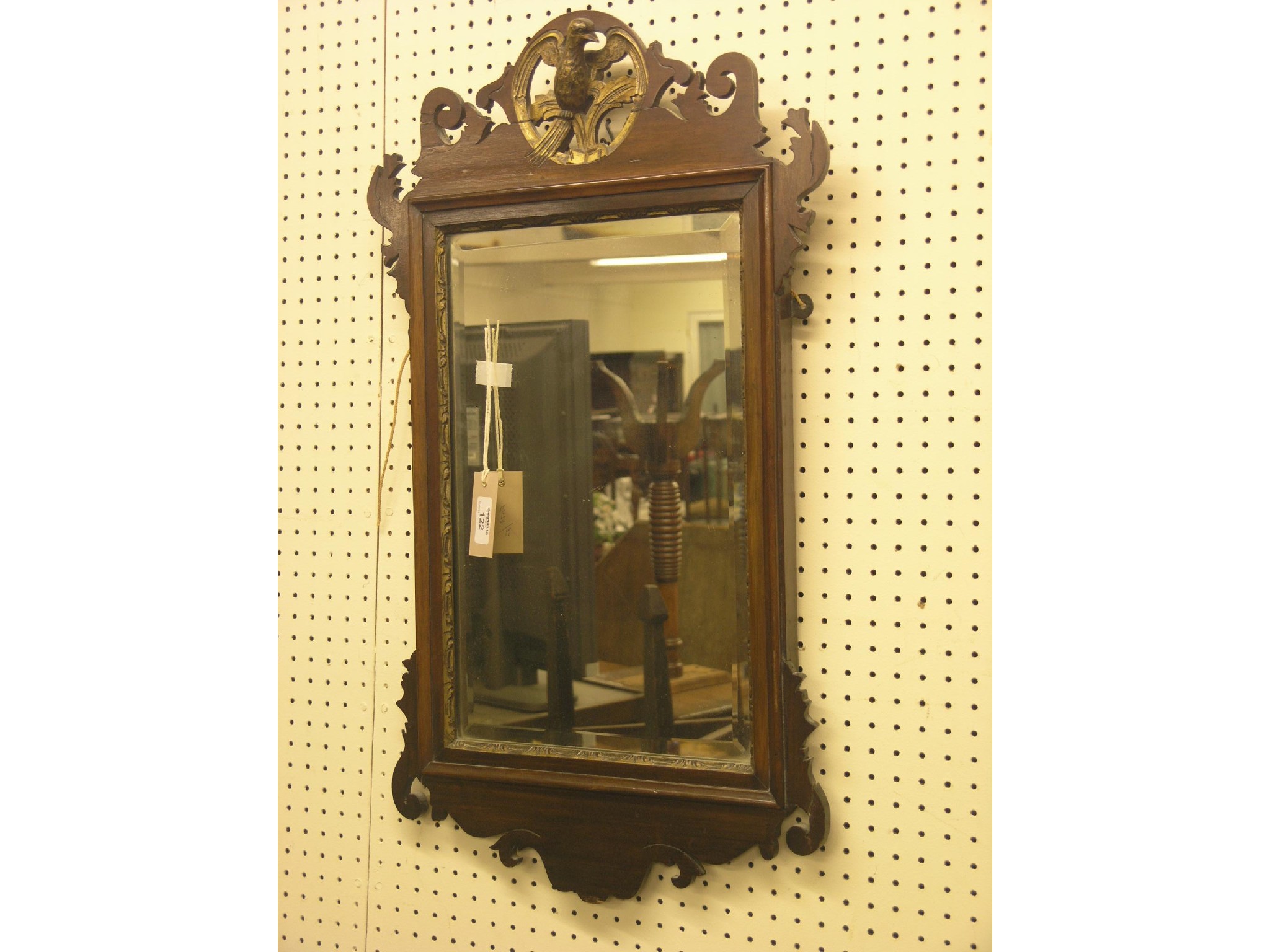 Appraisal: A Victorian Chippendale mahogany wall mirror with carved and parcel-gilt