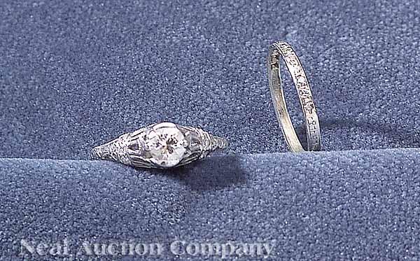 Appraisal: An Art Deco Platinum and Diamond Engagement Ring and Wedding