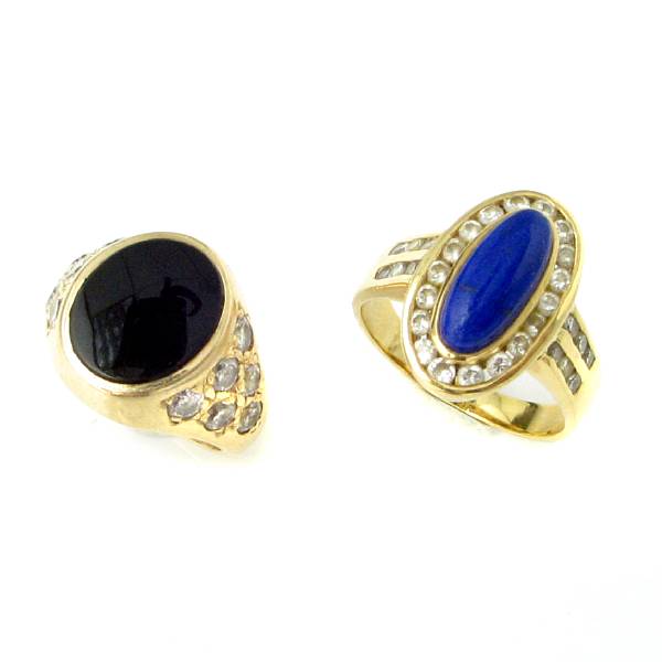 Appraisal: A pair of hardstone diamond and gold rings estimated total