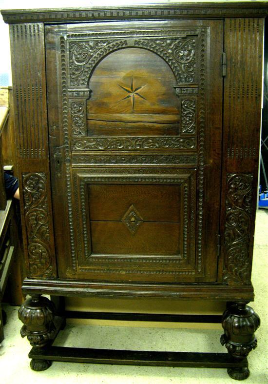 Appraisal: th th Century oak cupboard the panel door inlaid with