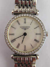 Appraisal: A stainless steel lady's wrist watch by Longines with diamond