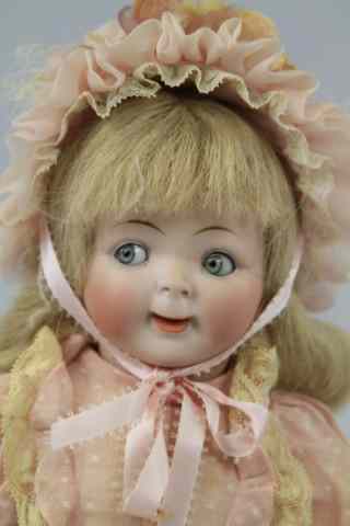 Appraisal: HERTEL SCHWAB GOOGLY TODDLER DOLL Bisque head incised '' -