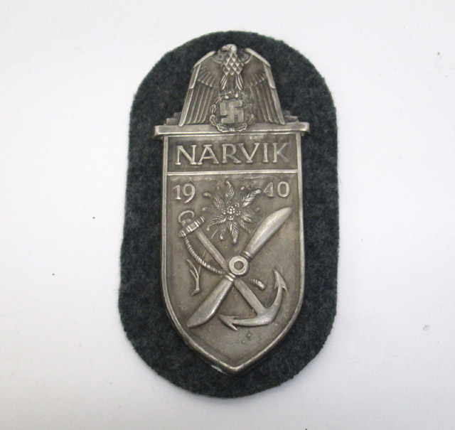 Appraisal: GERMAN WORLD WAR TWO NARVIK SHIELD army gray background silver