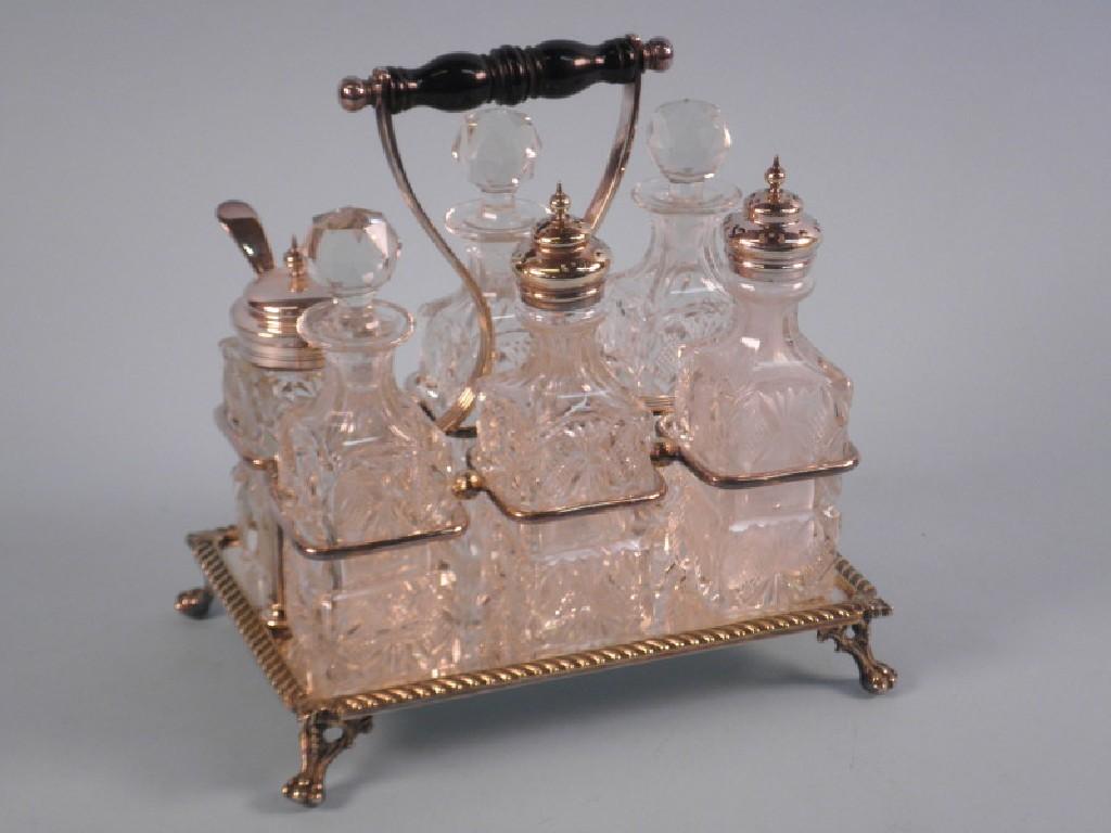 Appraisal: A late Victorian silver plated six bottle cruet stand with