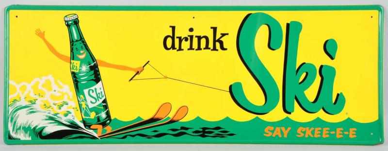 Appraisal: Tin Drink Ski Soda Sign Description Nice colorful image of