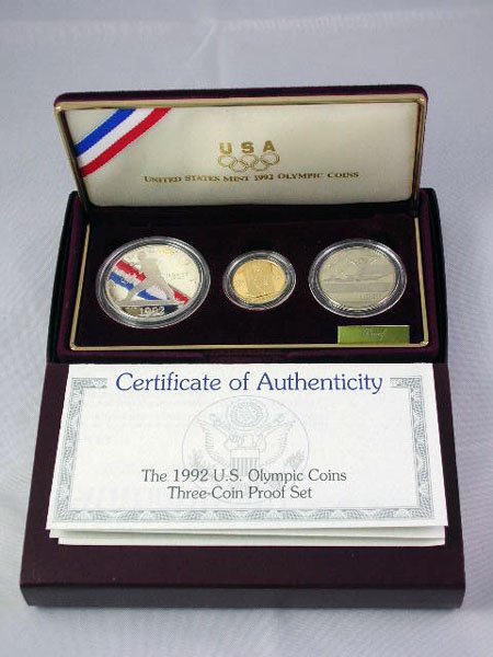 Appraisal: Olympic three coin proof set with gold piece silver dollar