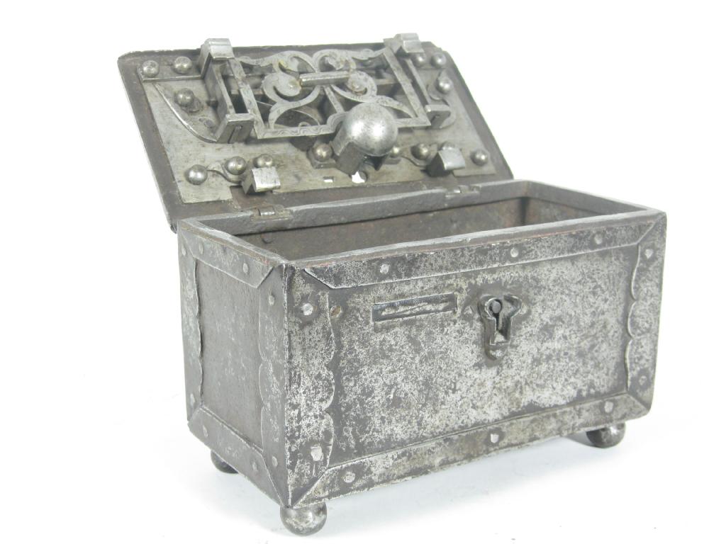 Appraisal: An antique German iron Money Box Casket with intricate engraved