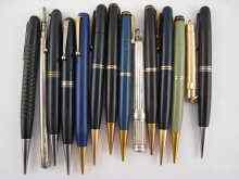 Appraisal: A mixed lot comprising eleven propelling pencils and three slide