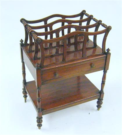 Appraisal: Victorian mahogany canterbury With a triple divided shaped fretwork top