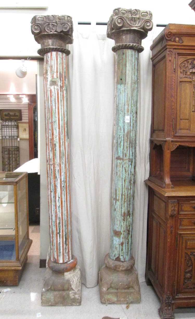 Appraisal: PAIR OF HAVELI TEAK AND SANDSTONE ARCHITECTURAL COLUMNS Mughal Empire