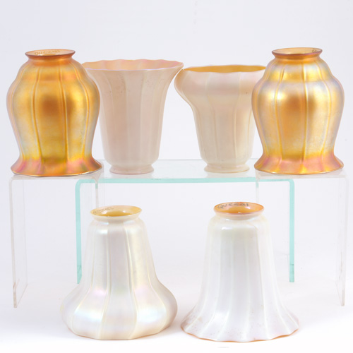 Appraisal: QUEZAL Three pairs of white and gold ribbed art glass