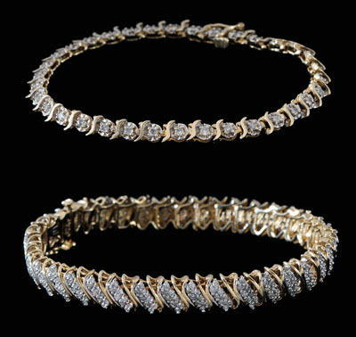 Appraisal: Two diamond tennis bracelets both S-link style with box tab