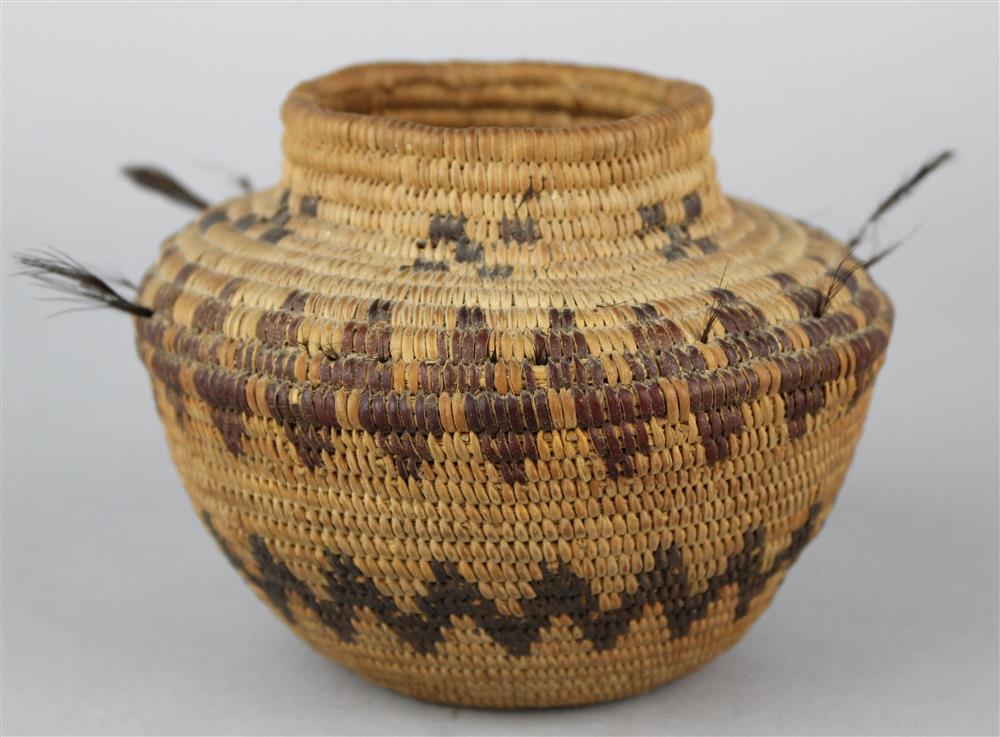 Appraisal: NATIVE AMERICAN COILED POLYCHROME BASKETRY JAR Yoquits circa red and