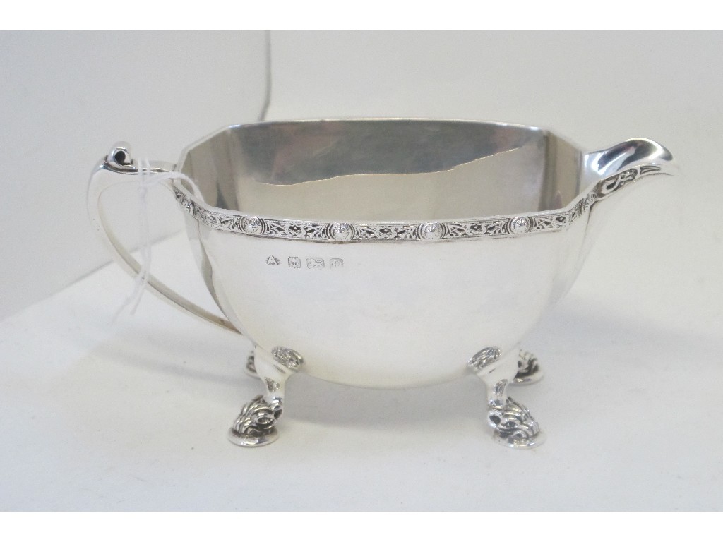 Appraisal: A silver sauceboat with Celtic decoration Birmingham