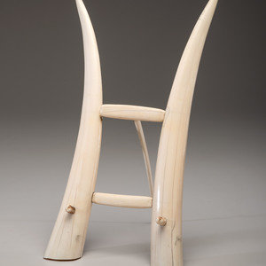 Appraisal: A Walrus Tusk Easel th Century Height inches Property from