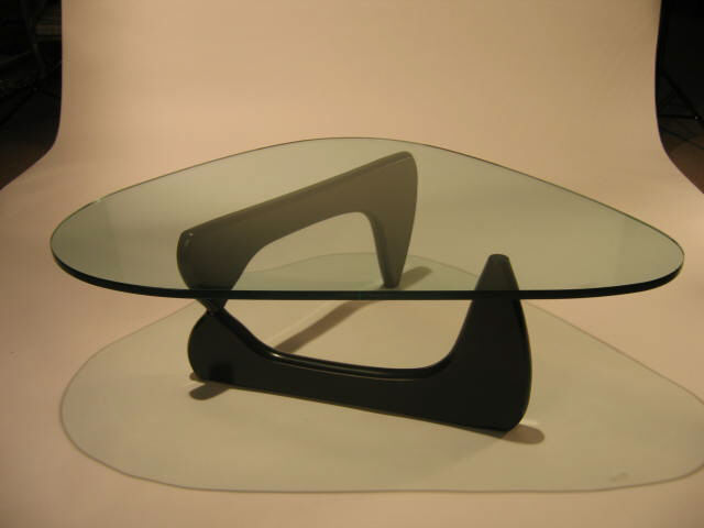 Appraisal: ISAMU NOGUCHI AMERICAN - IN- ebonized wood and glass manufactured