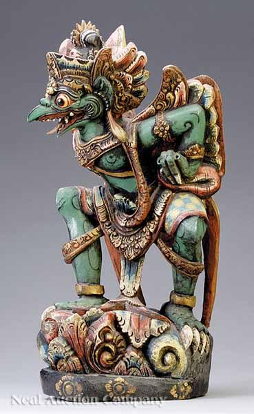 Appraisal: An Antique Indonesian Polychromed Wood Figure of Garuda the beak-nosed