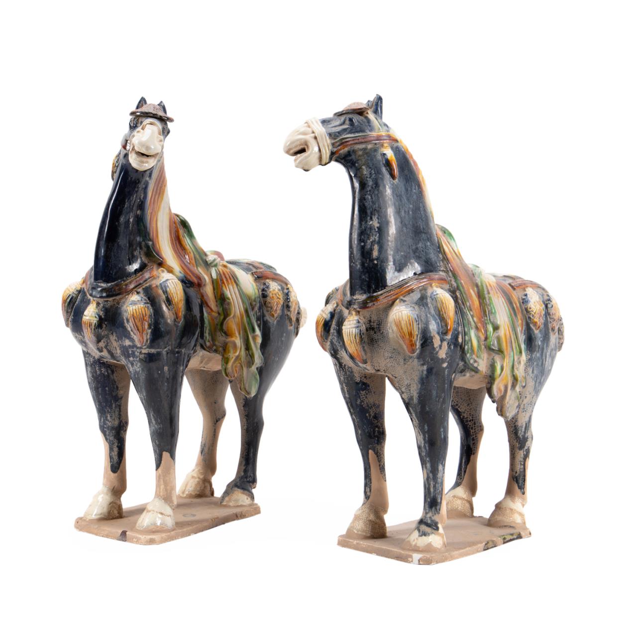 Appraisal: PAIR CHINESE TANG STYLE HORSES Pair of Chinese Tang style