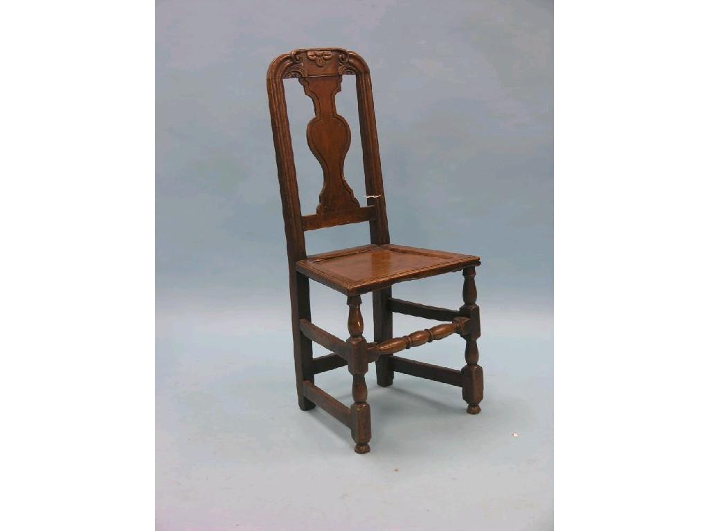 Appraisal: An early th century oak dining chair cresting rail carved