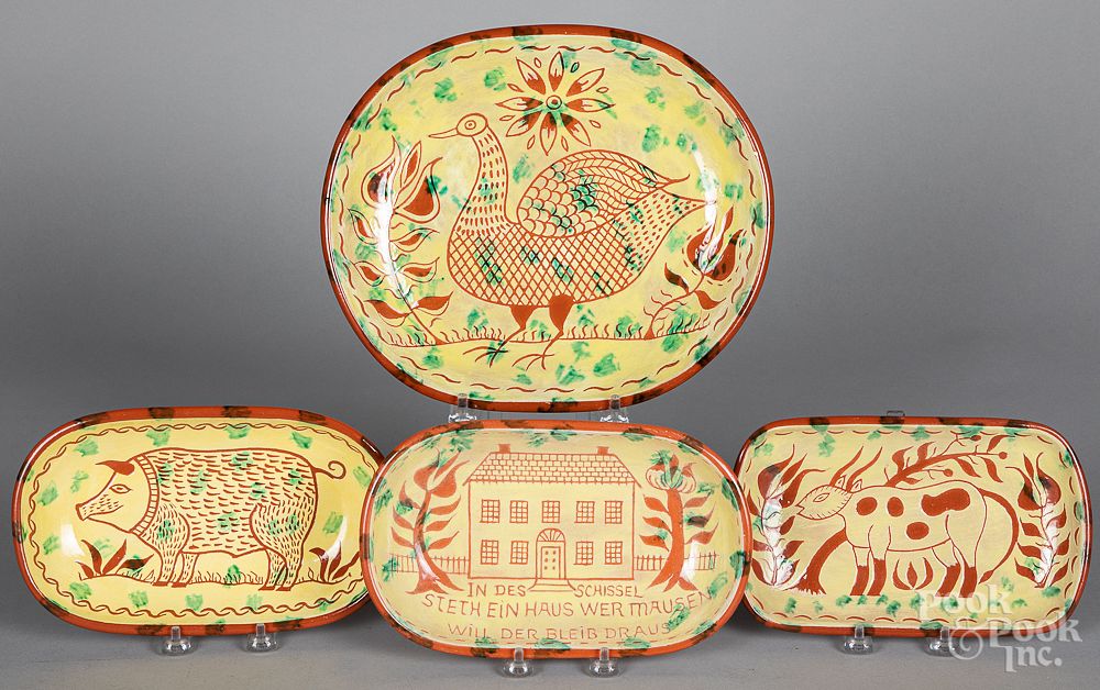 Appraisal: Four Seagreaves sgrafitto redware trays Four Seagreaves sgrafitto redware trays