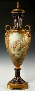 Appraisal: A -INCH ORMOLU-MOUNTED SEVRES TYPE URN SIGNED BERTREN A covered