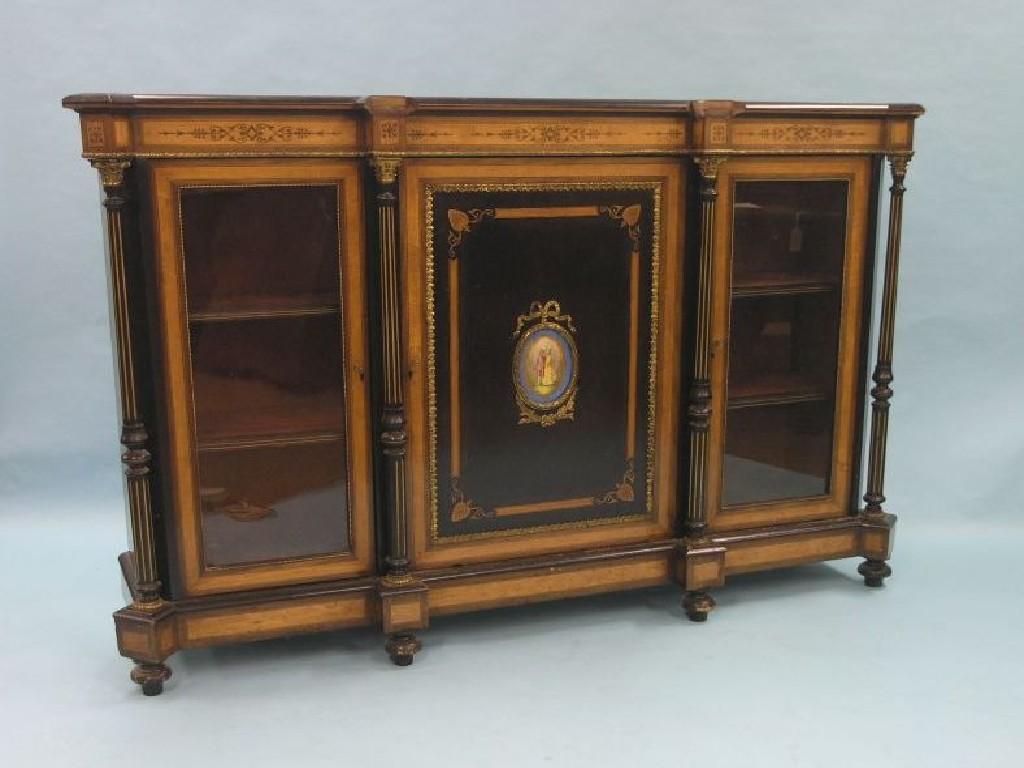 Appraisal: A Victorian satinwood and ebonised credenza with ormolu mounts central