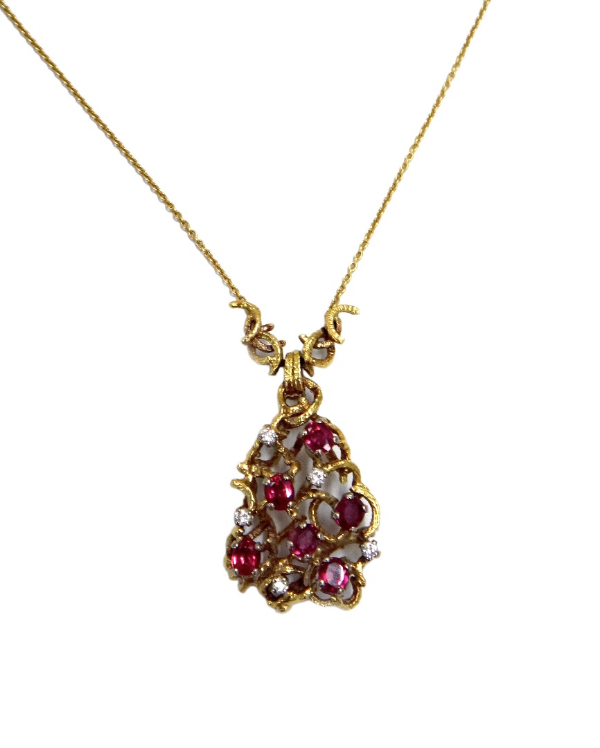 Appraisal: An ct gold ruby and diamond necklace the front claw