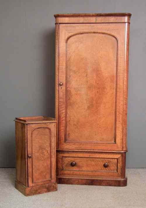 Appraisal: A Victorian figured walnut single wardrobe enclosed by a single