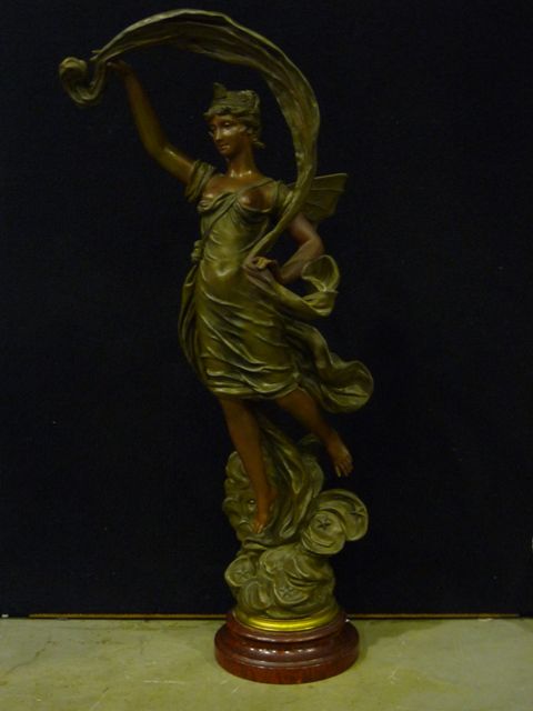 Appraisal: An Art Nouveau bronzed spelter figure of winged lady ascending