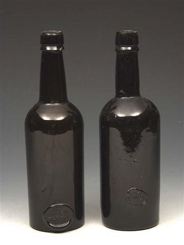 Appraisal: TWO INNER TEMPLE GREEN GLASS WINE BOTTLES with seals each