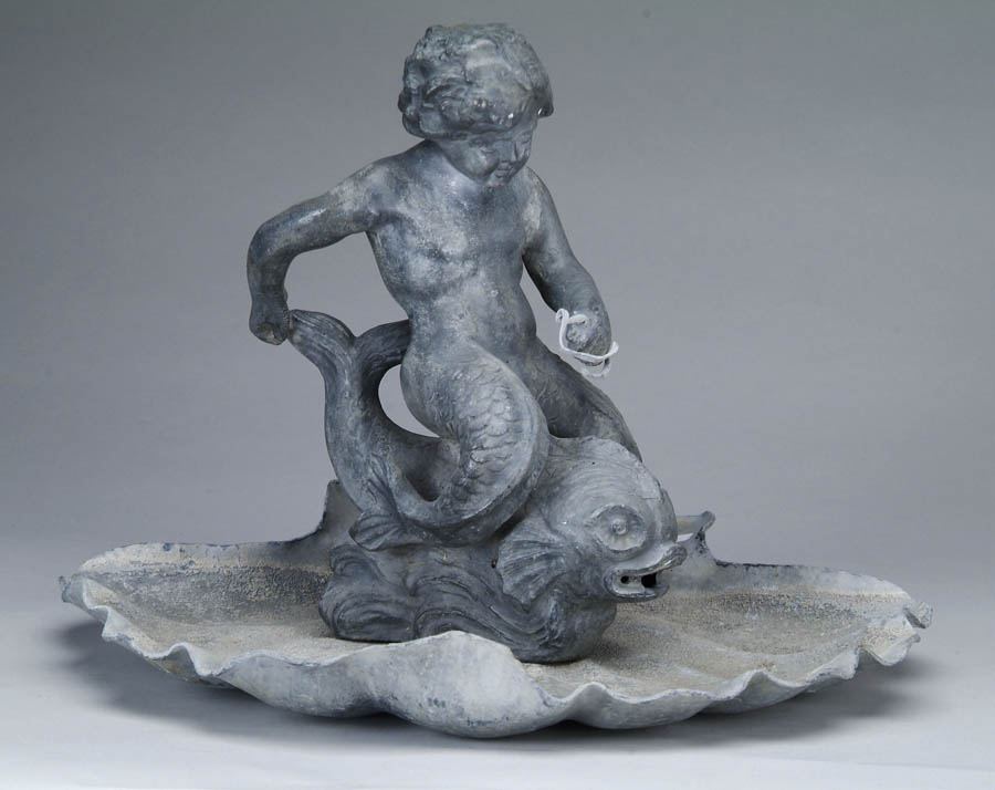 Appraisal: TWO PART LEAD FOUNTAIN Figural fountain has a mermaid type