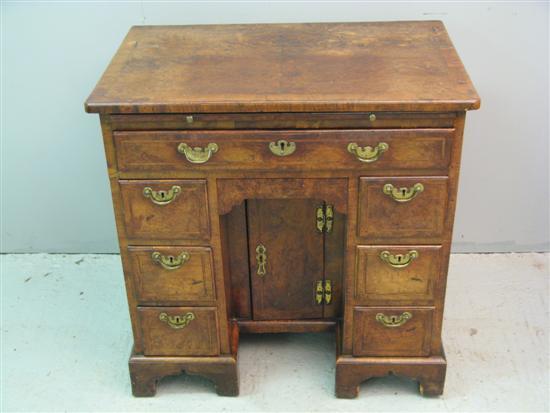 Appraisal: th century Walnut Knee Hole Desk with quartered veneered top