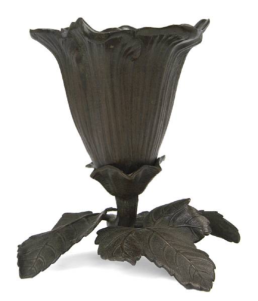 Appraisal: A patinated bronze floriform vase height in width in depth