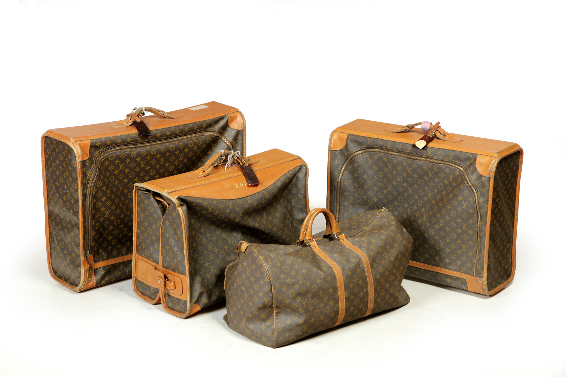 Appraisal: FOUR PIECES OF LOUIS VUITTON LUGGAGE France mid th century