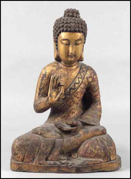 Appraisal: PAINTED AND PARCEL GILT SEATED BUDDHA Height '' Condition No