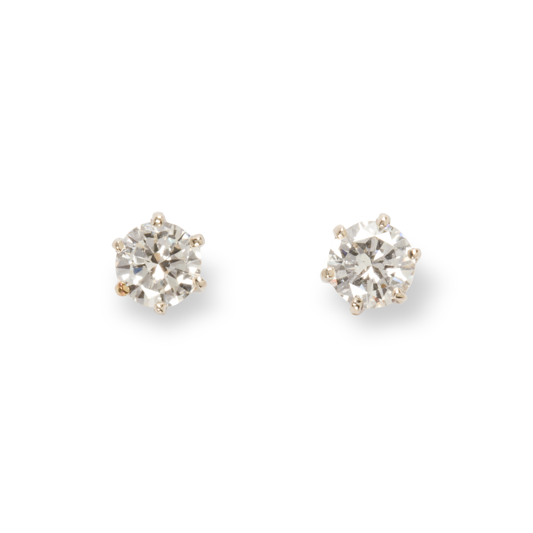 Appraisal: A PAIR OF DIAMOND AND FOURTEEN KARAT WHITE GOLD EARRINGS