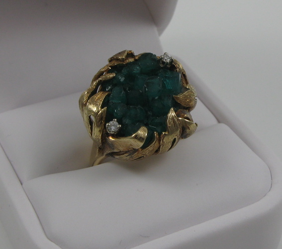 Appraisal: EMERALD DIAMOND AND FOURTEEN KARAT GOLD RING set with rough