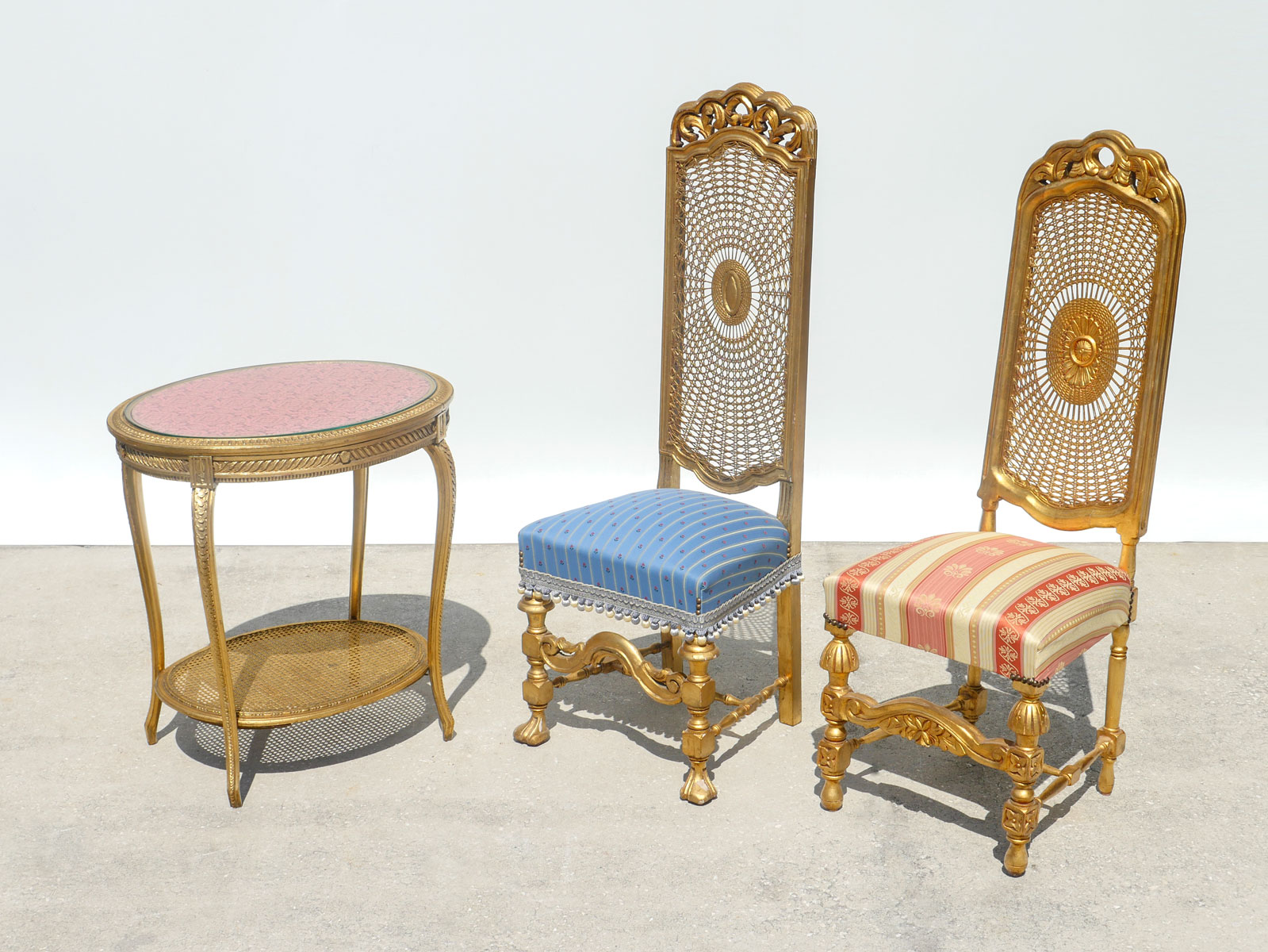 Appraisal: PIECE WOVEN CANE TABLE AND CHAIRS Comprising Gilt woven cane