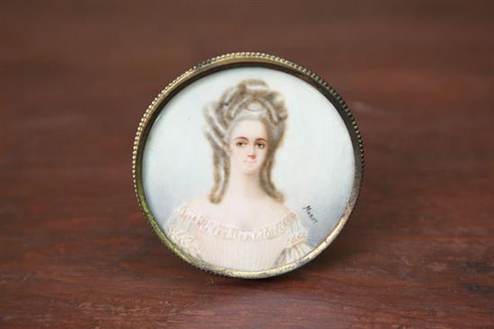 Appraisal: MINIATURE ON IVORY Quarter length portrait of a woman Signed