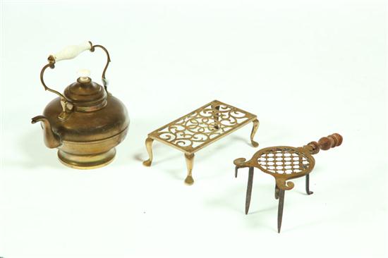 Appraisal: TWO BRASS TRIVETS AND A KETTLE American or English th