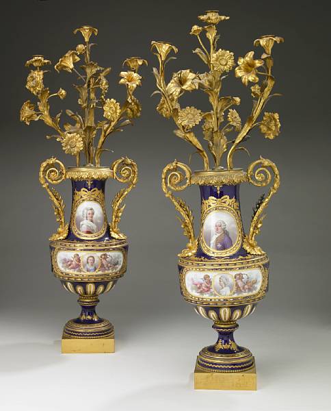 Appraisal: A pair of Sevres style jeweled porcelain gilt bronze mounted