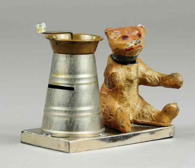 Appraisal: NODDING BEAR WITH BUTTER CHURN STILL BANK Germany lead seated