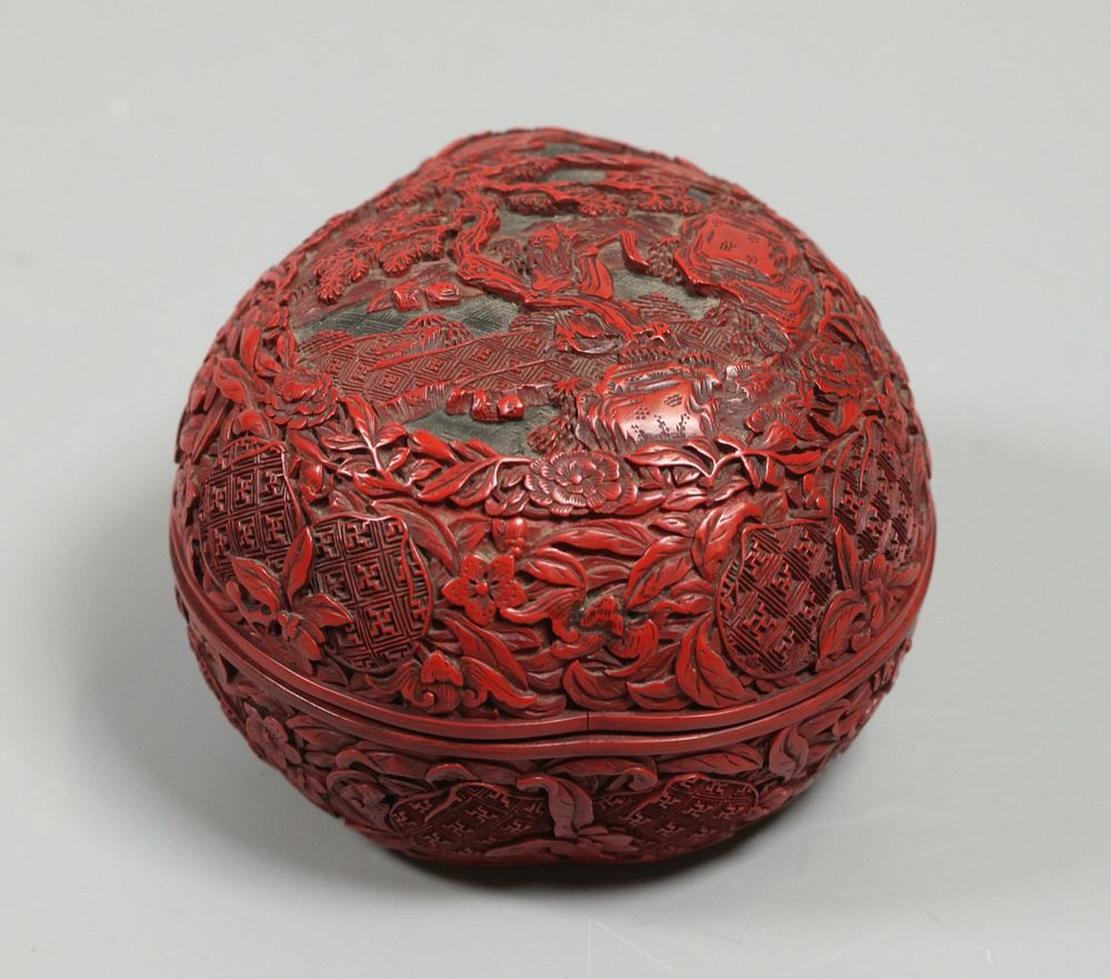 Appraisal: Chinese cinnabar box possibly th c peach form cinnabar box