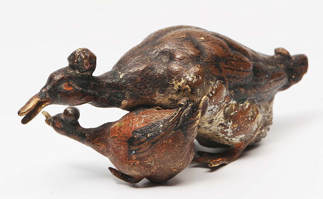 Appraisal: A COLD PAINTED BRONZE FIGURE a crested duck and duckling