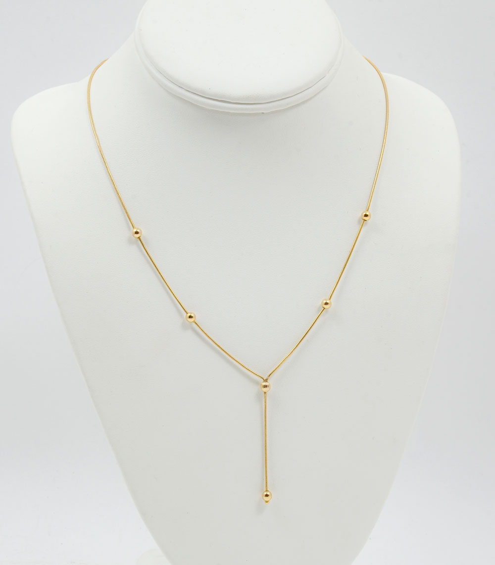 Appraisal: K ''Y'' NECKLACE WITH '' DROP Gold Beads are intermittently