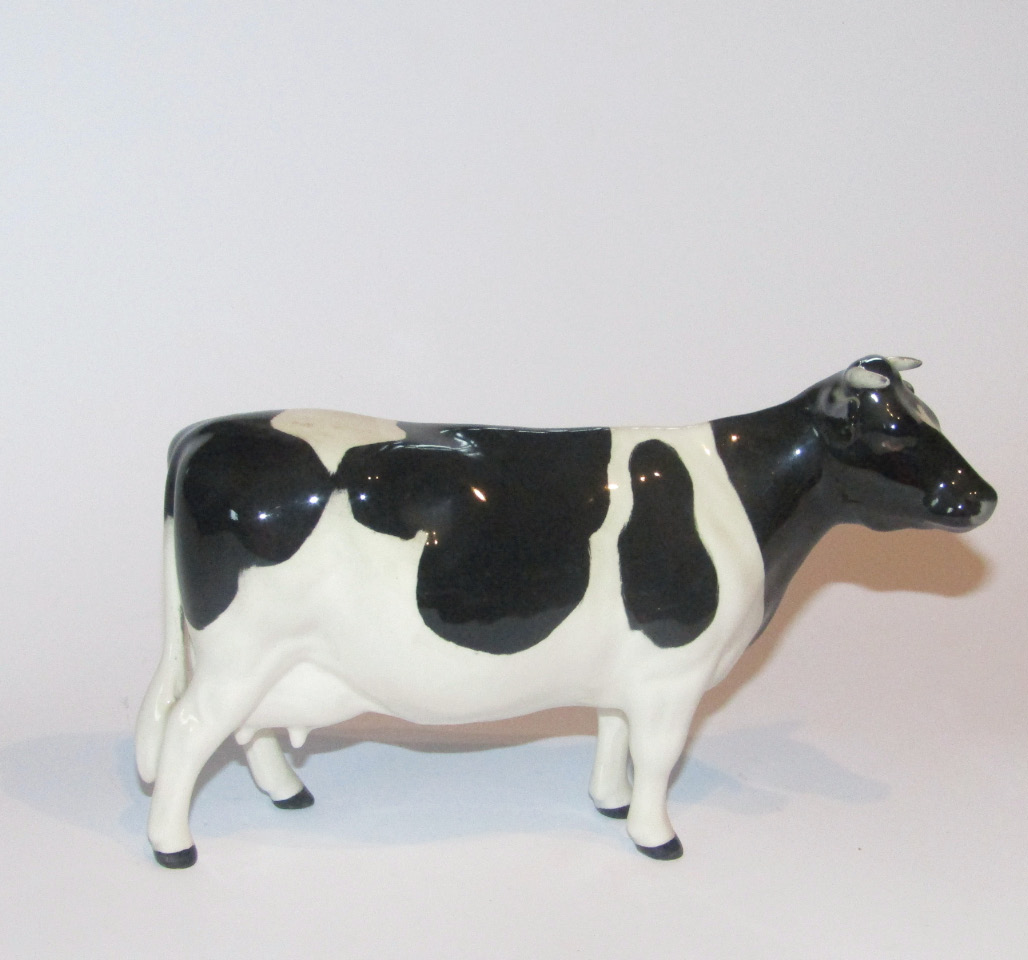 Appraisal: A thC Beswick pottery Friesian cow Claybury Leegwater printed marks