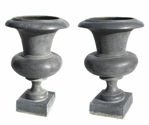 Appraisal: A pair of large lead garden urns height in diameter