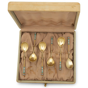 Appraisal: A Cased Set of Russian Enameled Silver-Gilt Spoons Retailed by